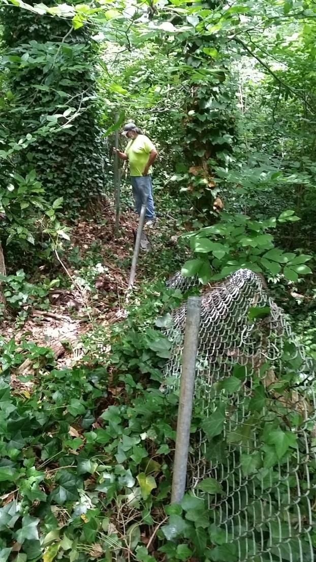 Before a completed chain link fence installation project in the Atlanta, GA area